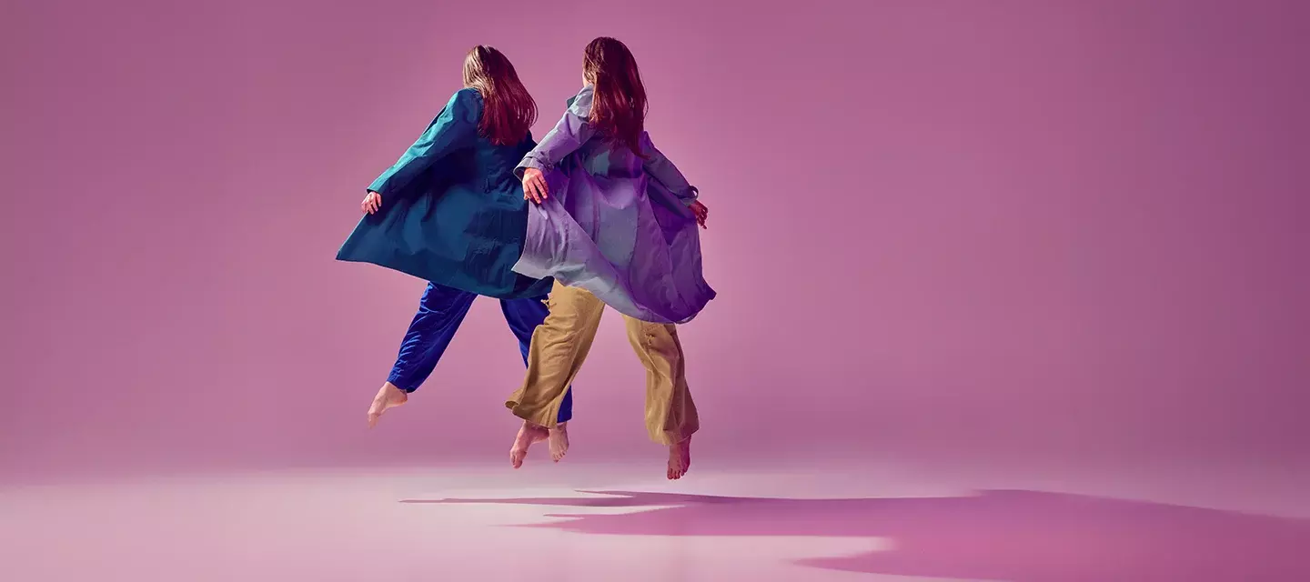 How to stay young Two contemporary dancers frozen in the air as if they were fyling
